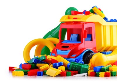 Colorful plastic children toys isolated on white background