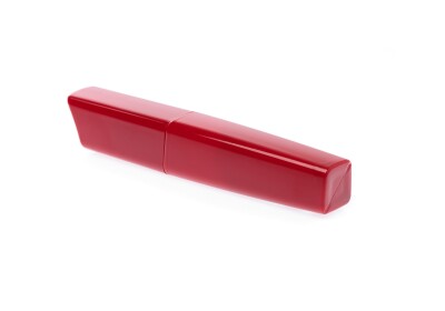 Red mascara Woman's cosmetics isolated on white background